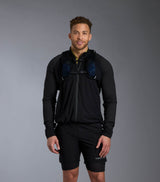 Miesten Light Air Jacket merinohybriditakki, väri Jet Black – mallin päällä